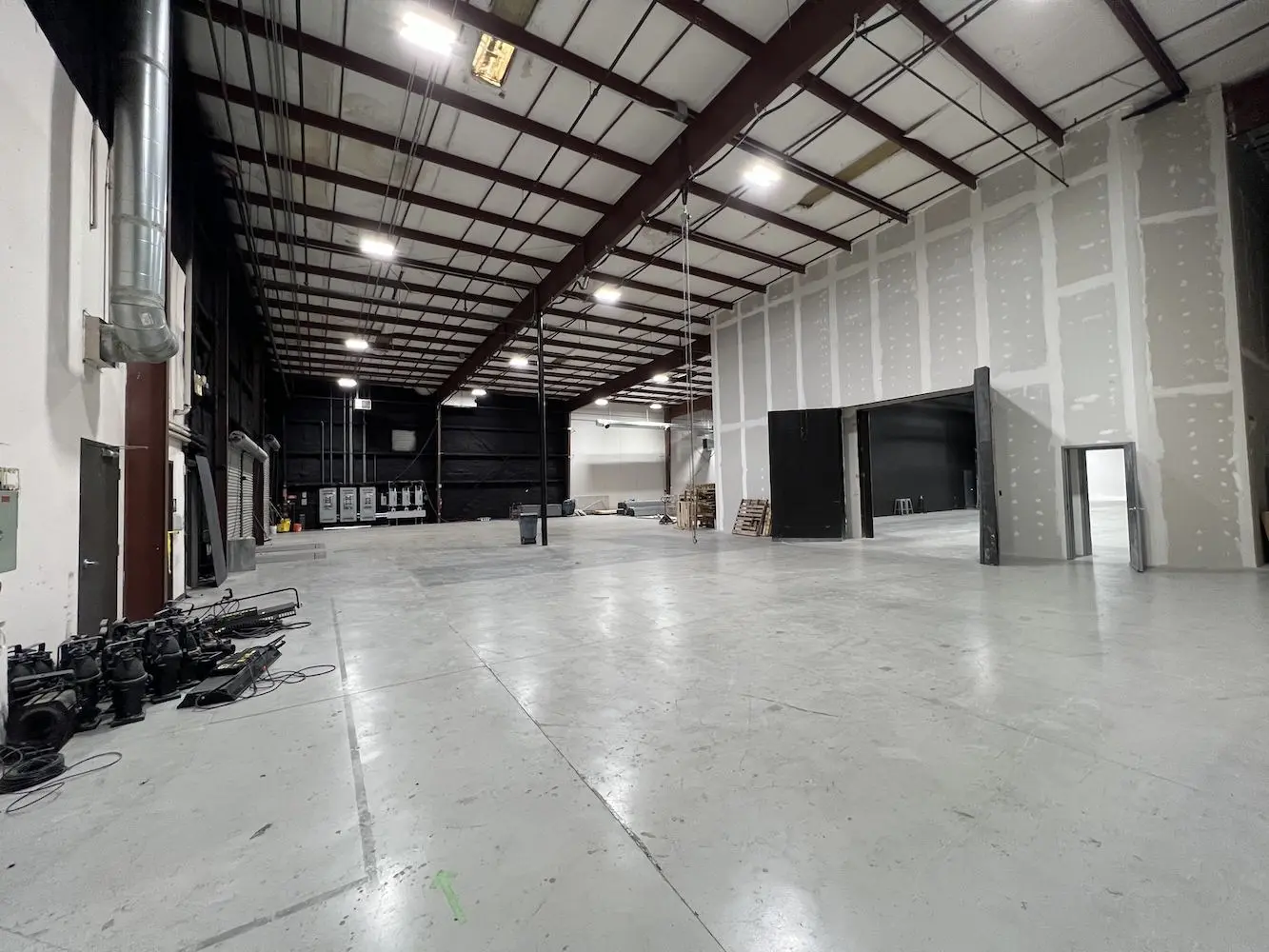 Stage 6 production space with high ceilings and black walls at Studio Space Atlanta West