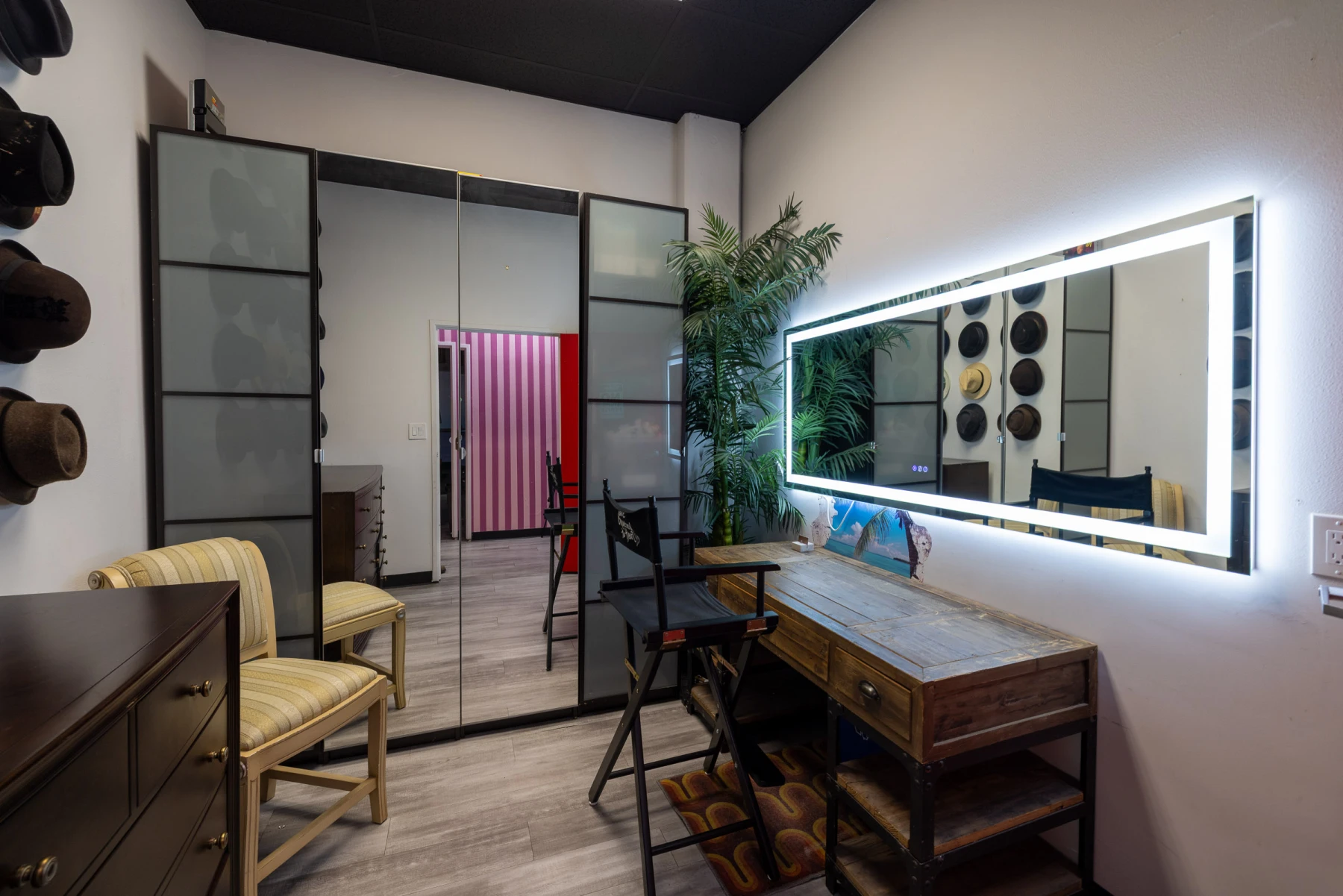 Hair makeup and wardrobe suite with lit vanity mirror